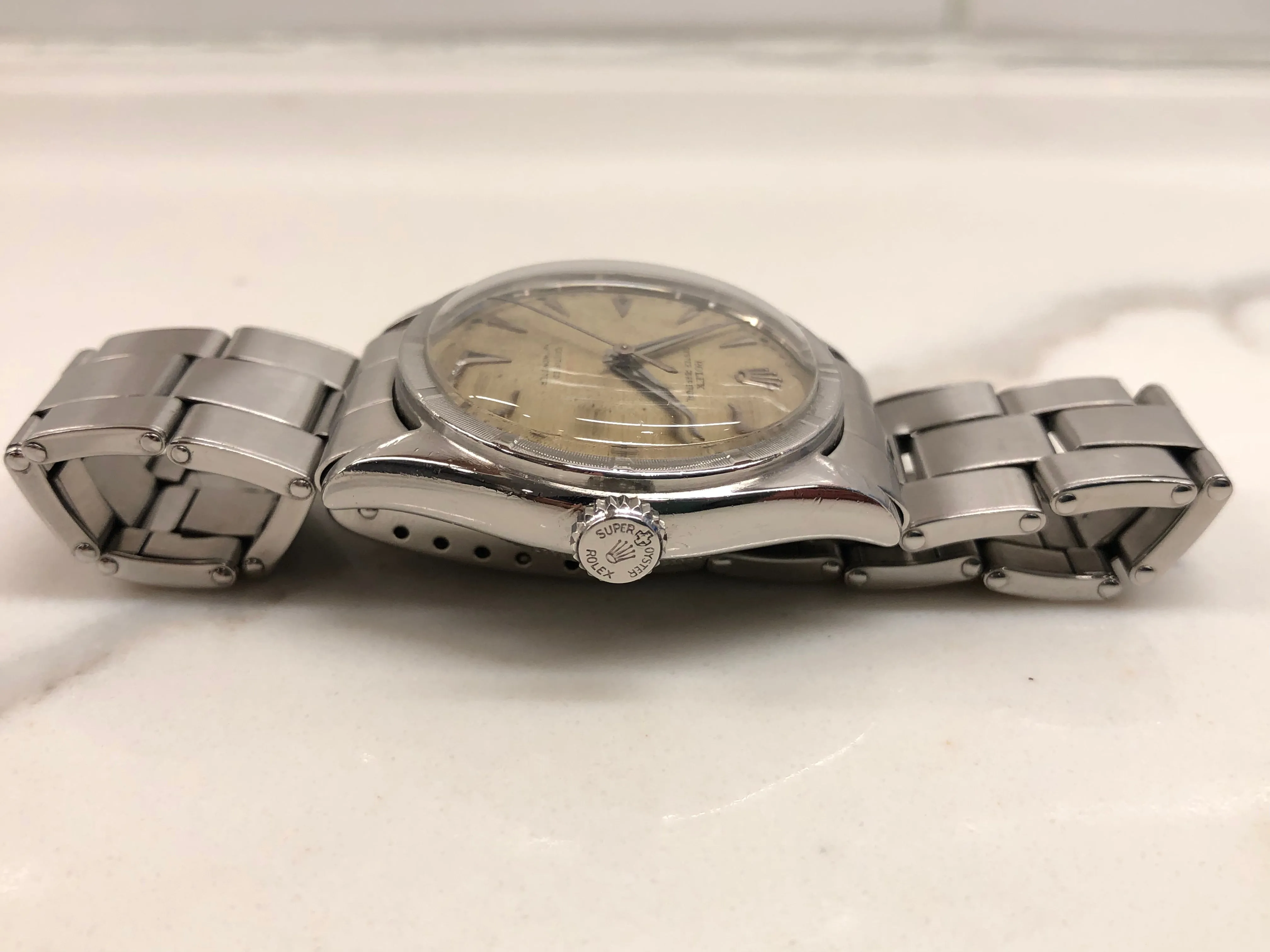 1953 Rolex Oyster Perpetual 6103 Stainless Steel Red OCC Chevron Dial Chronometer Automatic Wristwatch