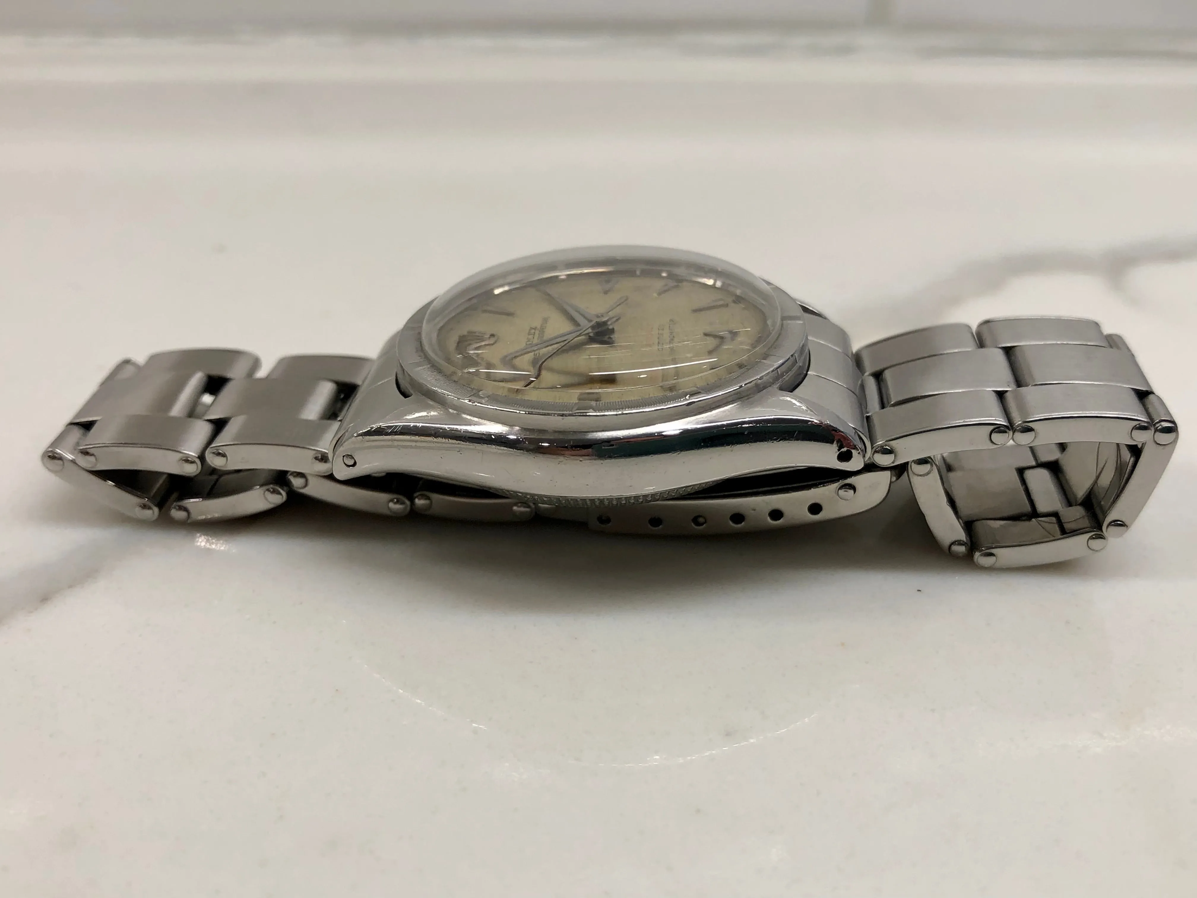 1953 Rolex Oyster Perpetual 6103 Stainless Steel Red OCC Chevron Dial Chronometer Automatic Wristwatch