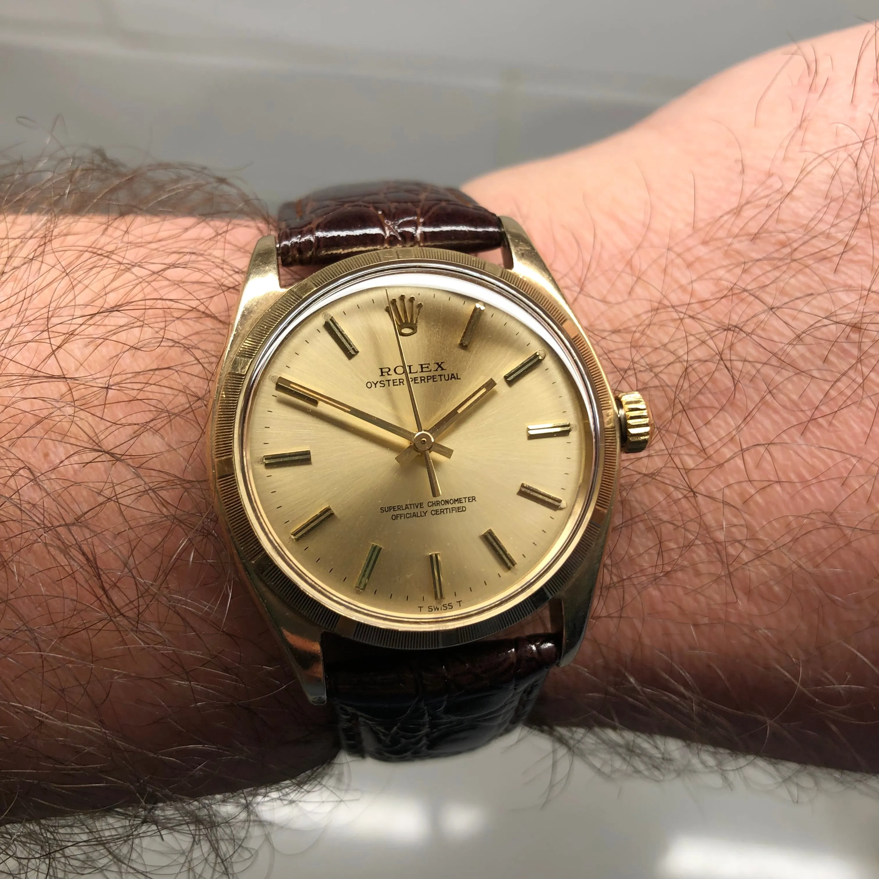 1961 Rolex Oyster Perpetual 1003 9k Yellow Gold English Chronometer Engine Turned Wristwatch