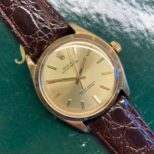 1961 Rolex Oyster Perpetual 1003 9k Yellow Gold English Chronometer Engine Turned Wristwatch