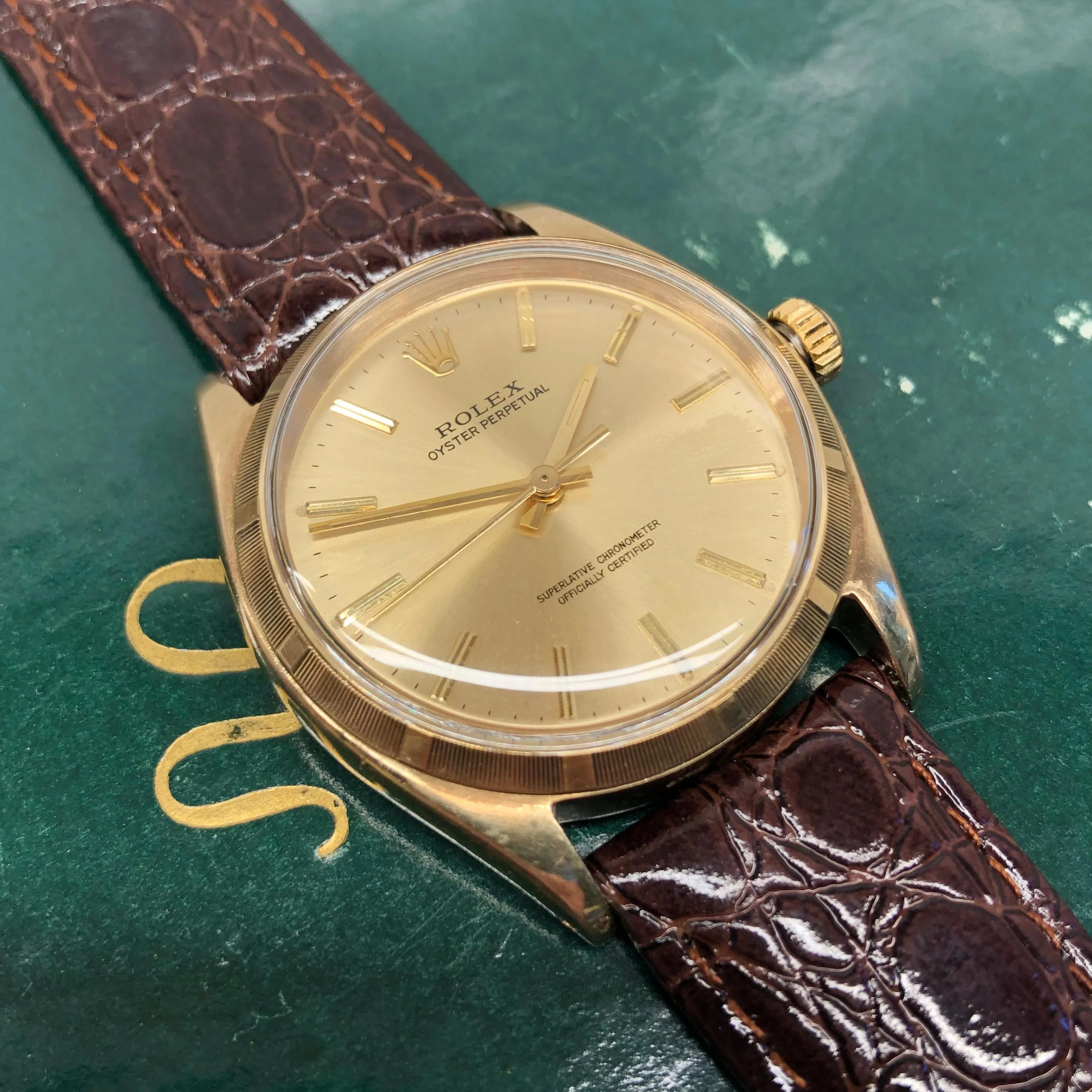 1961 Rolex Oyster Perpetual 1003 9k Yellow Gold English Chronometer Engine Turned Wristwatch
