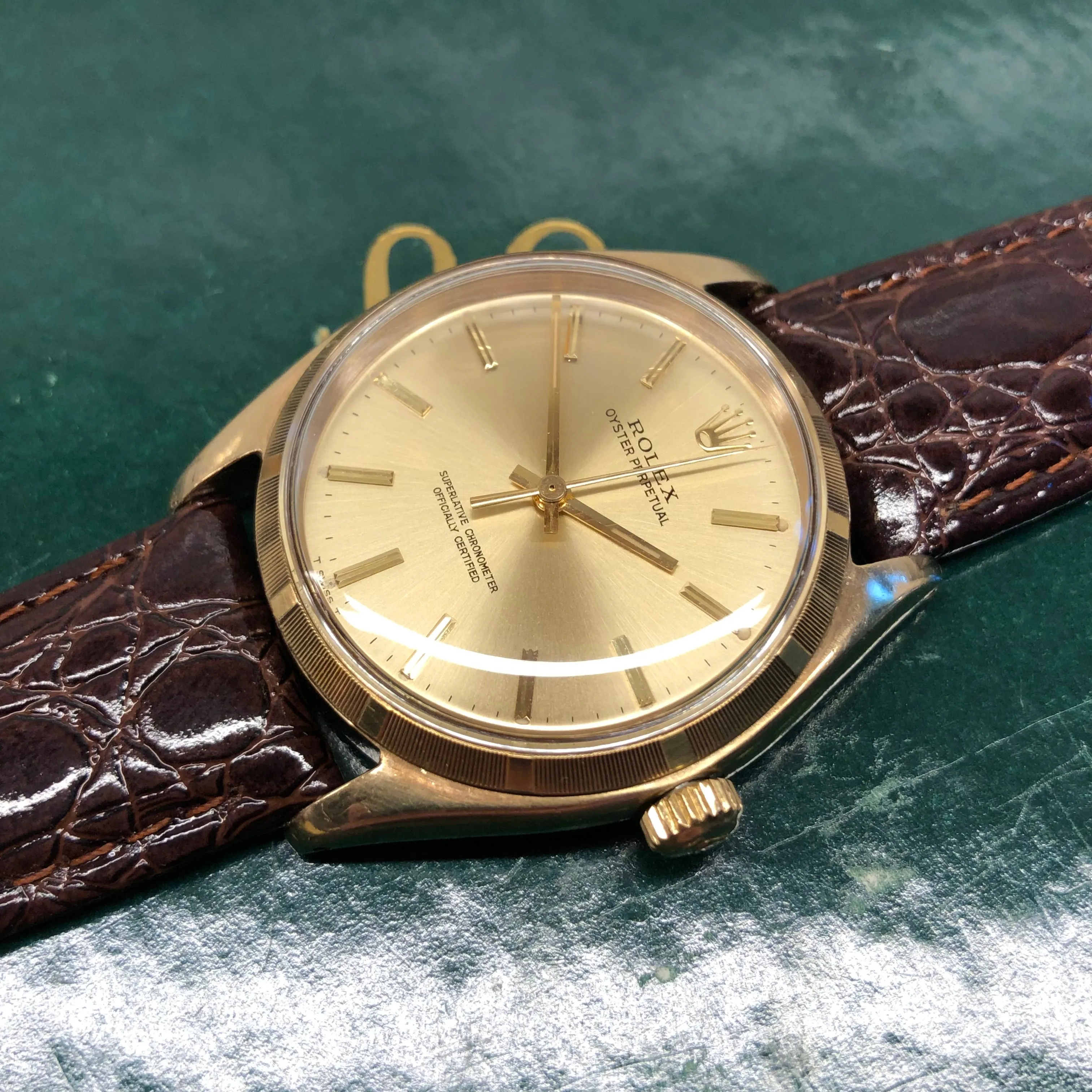 1961 Rolex Oyster Perpetual 1003 9k Yellow Gold English Chronometer Engine Turned Wristwatch