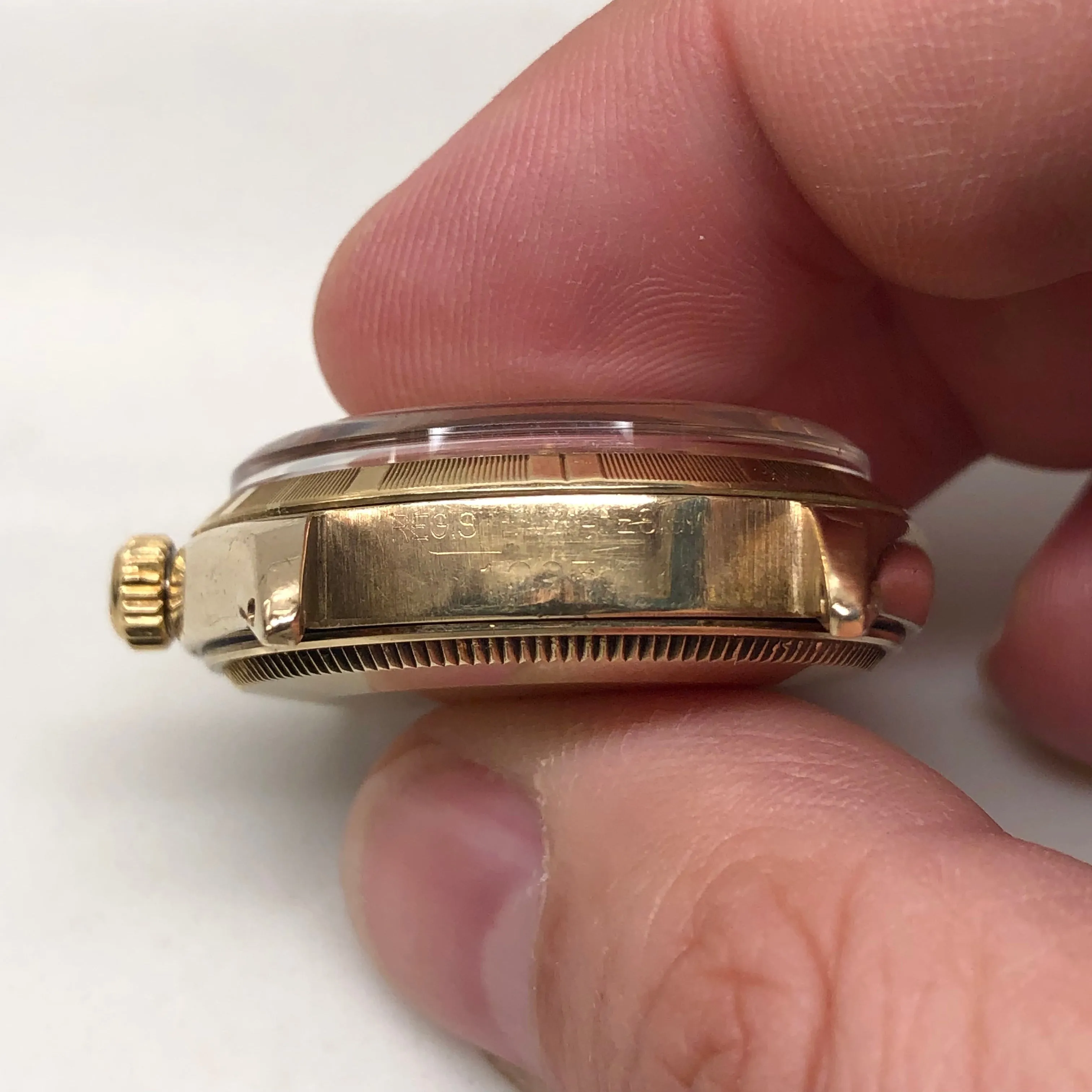 1961 Rolex Oyster Perpetual 1003 9k Yellow Gold English Chronometer Engine Turned Wristwatch