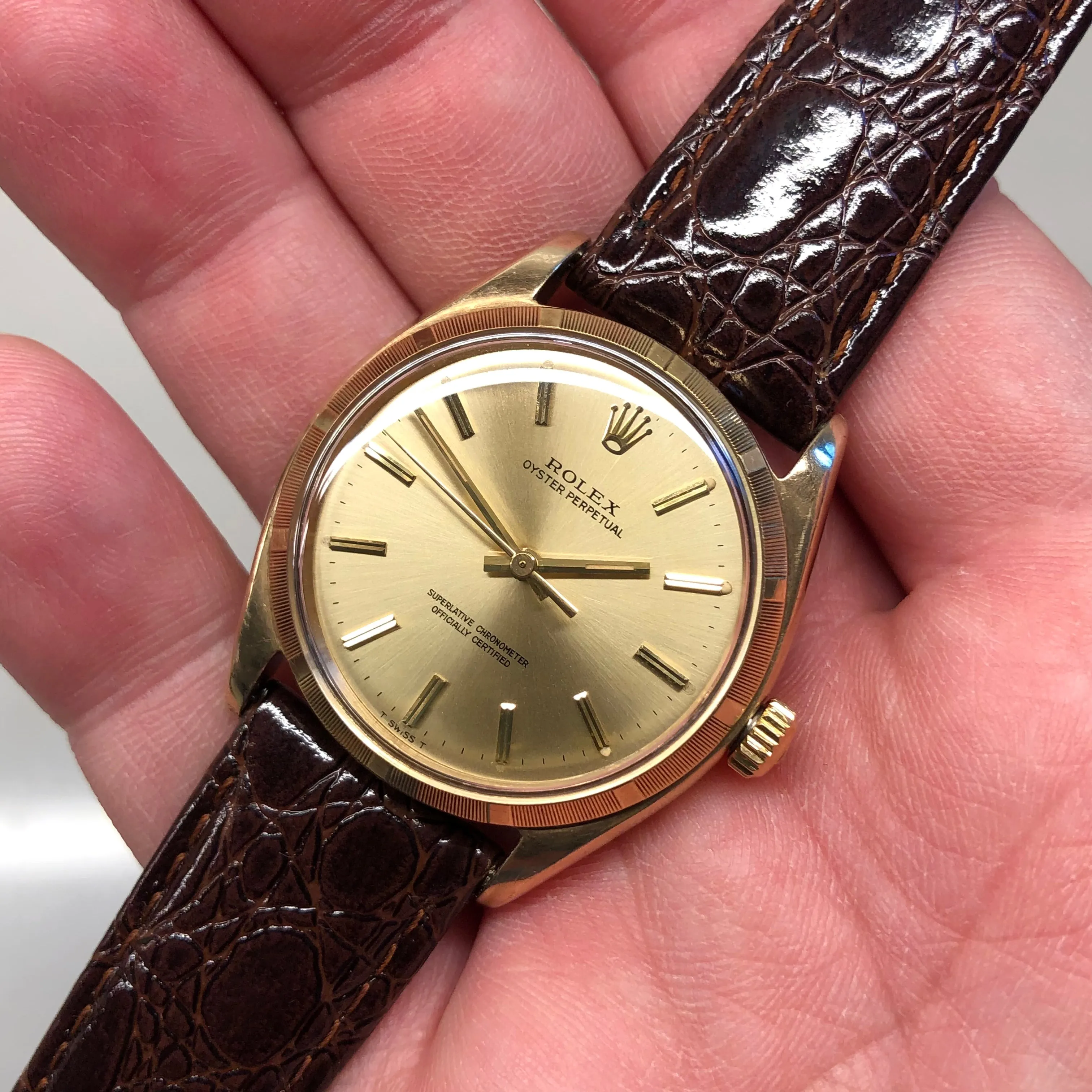 1961 Rolex Oyster Perpetual 1003 9k Yellow Gold English Chronometer Engine Turned Wristwatch