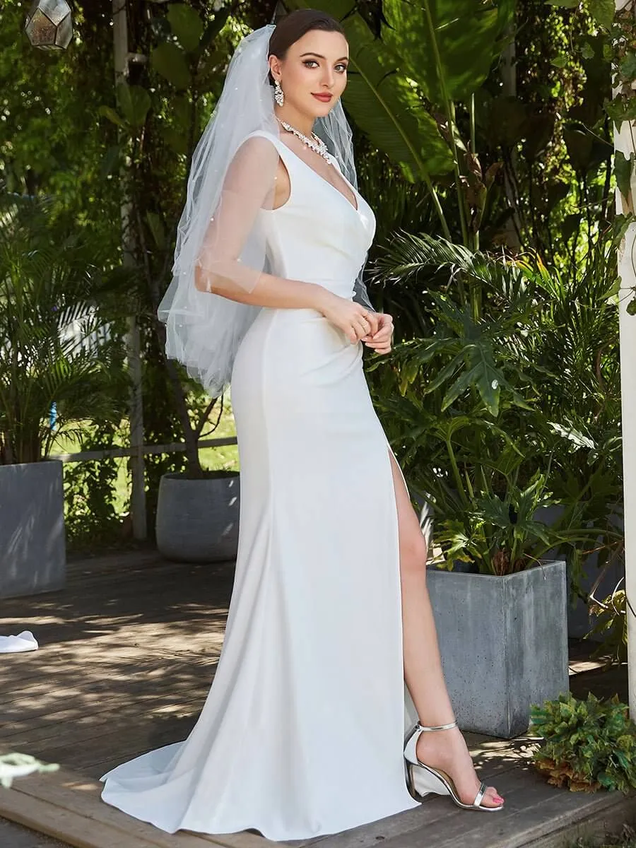 Nadine modern wedding dress with split and train in Ivory