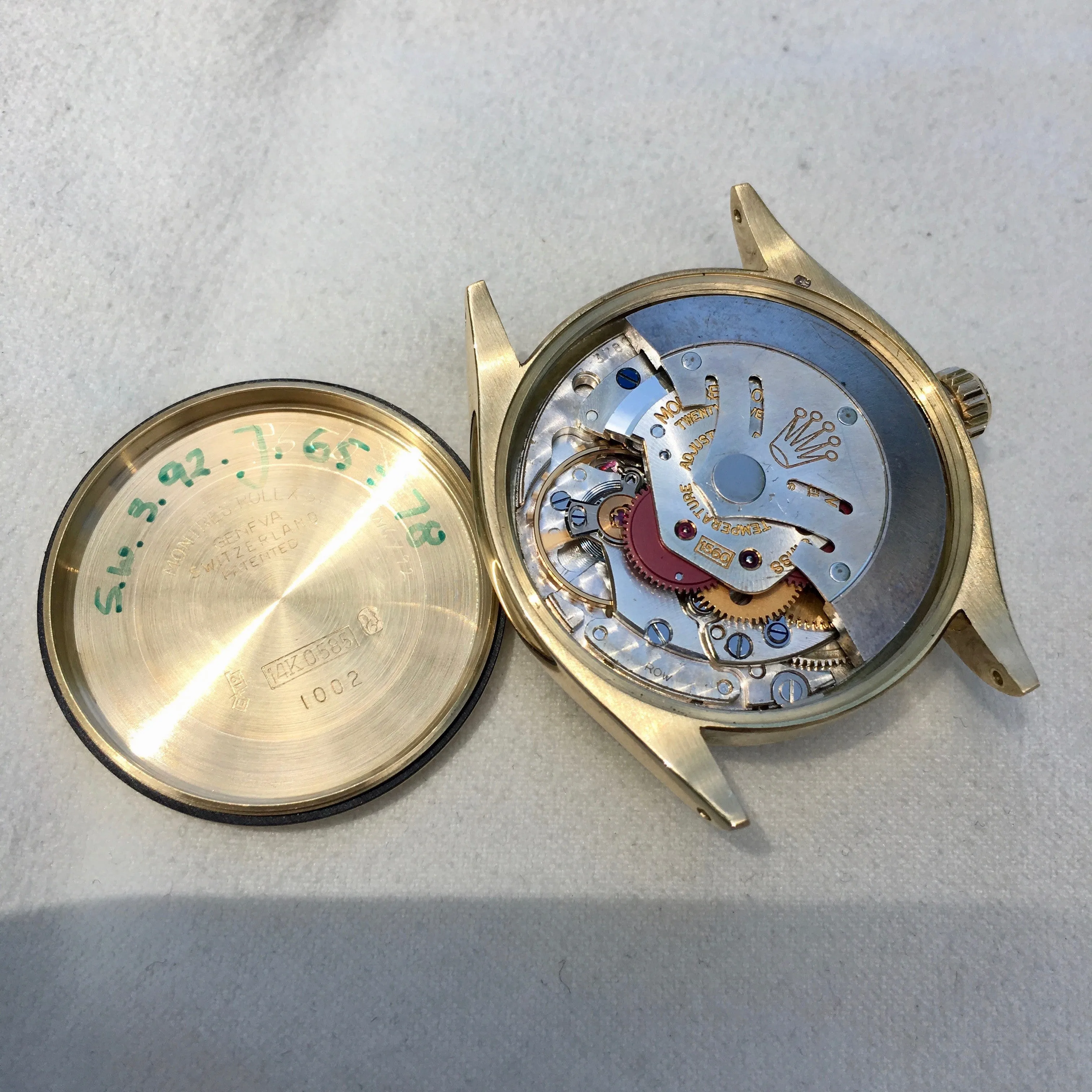 Vintage Rolex Oyster Perpetual 1002 14K Yellow Gold Caliber 1560 Silver Wristwatch